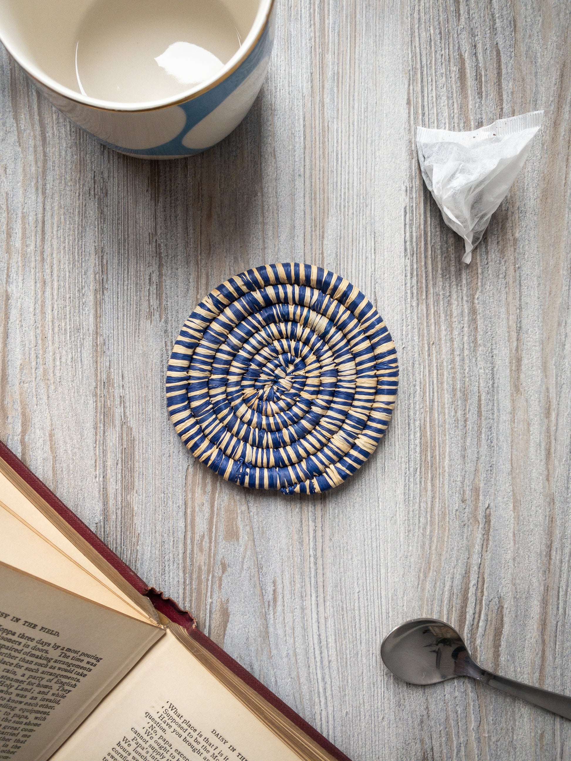 blue and white woven coasters from uganda