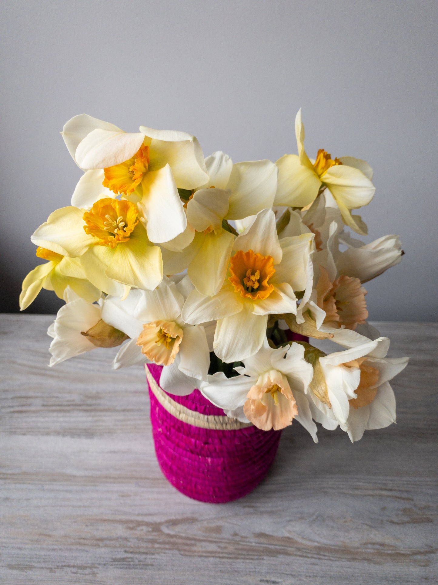 spring flowers in unique pink vase from uganda